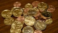 A photograph shows euro coins in Zagreb on December 30, 2022. - On January 1, 2023 the Euro will become the official currency in Croatia. (Photo by Denis LOVROVIC / AFP)