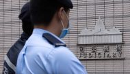 Police stands guard outside the West Kowloon Magistrates' courts in Hong Kong, China, on November 25, 2022. File Photo / Reuters