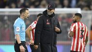  Liverpool manager Juergen Klopp (right) talks to referee Stuart Attwell after the match. Reuters
