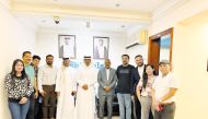 The Peninsula Advertising Department staff with Editor-in-Chief of The Peninsula Dr. Khalid Mubarak Al-Shafi, Managing Editor of The Peninsula Mohammed Osman Ali, Advertising Manager of Dar Al Sharq Group, Jassem Salman, and Assistant Advertising Manager Sushil Menon.
