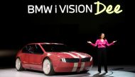 Stella Clarke, the project lead behind BMW’s E-ink color-changing cars, poses with the BMW i Vision Dee (Digital Emotional Experience) concept car during a BMW keynote address at CES 2023, an annual consumer electronics trade show, in Las Vegas, Nevada, US, January 4, 2023. (REUTERS/Steve Marcus)