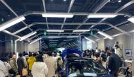 People protest at a Tesla showroom in Chengdu, Sichuan, China, released January 6, 2023 in this picture obtained by Reuters from social media. /via REUTERS 
