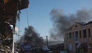 Plumes of smoke rise from a Russian strike during a 36-hour ceasefire over Orthodox Christmas declared by Russian President Vladimir Putin, as Russia's attack on Ukraine continues, from the frontline Donbas city of Bakhmut, Ukraine, on January 7, 2023. REUTERS/Clodagh Kilcoyne/File Photo
