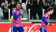 Juventus' Brazilian defender Danilo celebrates with Nicolo Fagioli after opening the scoring during the Italian Serie A match between Juventus and Udinese on January 7, 2022 at the Allianz Stadium in Turin. (Photo by Isabella BONOTTO / AFP)