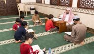 Students learning Quran at Dar Al Salam Holy Quran Learning Center in Abu Hamour