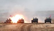 British Army Challenger 2 tank fires during NATO enhanced Forward Presence battle group Iron Spear 2019 exercise in Adazi, Latvia, on October 11, 2019. File Photo / Reuters
