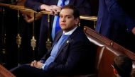 Newly elected freshman Rep. George Santos (R-NY), embroiled in a scandal over his resume and claims made on the campaign trail, sits alone in the House Chamber surrounded only by the children of other representatives, on the first day of the 118th Congress at the US Capitol in Washington, US, on January 3, 2023. REUTERS/Jonathan Ernst/File Photo
