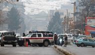 Taliban security forces block a road after a suicide blast near Afghanistan's foreign ministry at the Zanbaq Square in Kabul on January 11, 2023. (Photo by Wakil Kohsar / AFP)