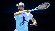 Serbia's Novak Djokovic attends a practice session ahead of the Australian Open tennis tournament in Melbourne on January 12, 2023. (Photo by Patrick HAMILTON / AFP)