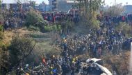 A general view of people gathered after the plane crash in Pokhara, Nepal January 15, 2023 in this picture obtained from social media. Naresh Giri/via REUTERS