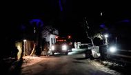 Secret Service personnel park vehicles in the driveway leading to U.S. President Joe Biden's house after classified documents were reported found there by the White House in Wilmington, Delaware, US, on January 14, 2023. REUTERS/Joshua Roberts
