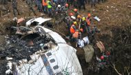 Nepal observed a day of mourning on January 16 for the victims of the nation's deadliest aviation disaster in three decades, with 67 people confirmed killed in the plane crash. (Photo by PRAKASH MATHEMA / AFP)
