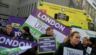 Ambulance workers strike outside their Waterloo station, amid a dispute with the government over pay, in London, Britain on January 11, 2023. REUTERS/Toby Melville
