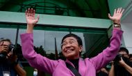 Nobel Laureate Maria Ressa gestures after she was acquitted of the tax evasion cases against her at the Court of Tax Appeals in Quezon City, Metro Manila on January 18, 2023. (Photo by JAM STA ROSA / AFP)