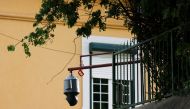 A surveillance camera is seen pointed to the exterior of the Chinese embassy in Lisbon, Portugal, December 21, 2022. (REUTERS/Pedro Nunes)

