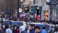 People walk along a busy shopping street, during the traditional Boxing Day sales in London, Britain, December 26, 2022. REUTERS/Maja Smiejkowska/File Photo
