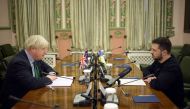 This handout picture taken and released by Ukrainian Presidential Press Service on January 22, 2023, shows former British Prime Minister Boris Johnson (left) during talks with the Ukrainian President Volodymyr Zelensky in Kyiv, amid the Russian invasion of Ukraine. (Photo by Handout / Ukrainian Presidential Press Service / AFP)