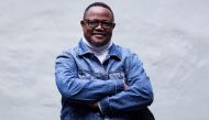 File Photo: November 14, 2020 Tanzanian opposition leader Tundu Lissu poses during an interview with AFP at his home in Tienen. - Tanzanian opposition leader Tundu Lissu arrived back in his homeland on January 25, 2023 after about five years in exile, his Chadema party said. Chadema posted a photo on Twitter of Lissu greeting senior members of the party on arrival at the international airport in Dar Es Salaam. (Photo by Kenzo TRIBOUILLARD / AFP)