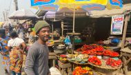 Nigerian artist Olufela Omokeko buys fresh pepper at a food market in Lagos, Nigeria January 19, 2023. REUTERS/Seun Sanni