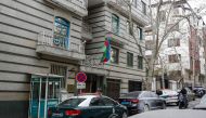 Police stay guard in front of the Azerbaijan embassy in Tehran on January 27, 2023, following an attack. File Photo: AFP

