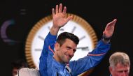 Serbia's Novak Djokovic waves as he leaves after victory against Tommy Paul of the US during their men's singles semi-final match on day twelve of the Australian Open tennis tournament in Melbourne on January 27, 2023. (Photo by WILLIAM WEST / AFP) 