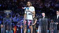 Greece's Stefanos Tsitsipas speaks during a trophy ceremony after his men's singles final match against Serbia's Novak Djokovic on day fourteen of the Australian Open tennis tournament in Melbourne on January 29, 2023. (Photo by MANAN VATSYAYANA / AFP)