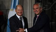 Argentine President Alberto Fernandez and German Chancellor Olaf Scholz (left) during a joint presser at Palacio San Martin in Buenos Aires, on January 28, 2023. (Photo by Luis Robayo / AFP)