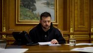Ukraine's President Volodymyr Zelensky speaks with German Chancellor Olaf Scholz (not pictured) via phone line, amid Russia's attack on Ukraine, in Kyiv, Ukraine January 25, 2023. (Ukrainian Presidential Press Service/Handout via REUTERS)