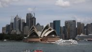 The Sydney Opera House and city centre skyline are seen in Sydney