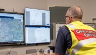 A member of the Incident Management Team coordinates the search for a radioactive capsule that was lost in transit by a contractor hired by Rio Tinto, at the Emergency Services Complex in Cockburn, Australia, in this undated handout photo. Department of Fire and Emergency Services/Handout via REUTERS

