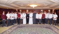 QIIB Chairman H E Sheikh Dr. Khalid bin Thani bin Abdullah al Thani and QIIB Chief Executive Officer Dr. Abdulbasit Ahmed al Shaibei with the students. 