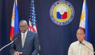 US Defense Secretary Lloyd Austin III (left) with his Philippine counterpart Carlito Galvez Jr. at a joint press conference in Camp Aguinaldo military headquarters in metro Manila on February 2, 2023. (Photo by Joeal Calupitan / AFP)