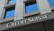 FILE PHOTO: A logo is pictured on the Credit Suisse bank in Geneva, Switzerland, June 9, 2022. REUTERS/Denis Balibouse