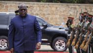President of the Democratic Republic of the Congo Felix Tshisekedi inspects the guard of honor upon arrival during the extraordinary Summit of East African Community Heads of State at the state house in Bujumbura, Burundi, on February 4, 2023. (Photo by Tchandrou Nitanga / AFP)