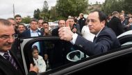 Former Cypriot foreign minister and presidential candidate Nikos Christodoulides greets supporters at the Geroskypou polling centre in the western Paphos district, on February 5, 2023. (Photo by Iakovos Hatzistavrou / AFP)
