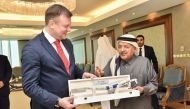 Sheikh Faisal bin Qassim Al Thani, QBA Chairman exchanges a memento with Minister of Development Cooperation and Foreign Trade of the Republic of Finland, H E Ville Skinnari.