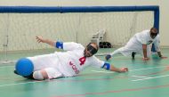A goalball training session in progress.