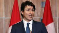 In this file photo taken on February 21, 2022, Canadian Prime Minister Justin Trudeau speaks during a news conference in Ottawa, Ontario, Canada. (Photo by Dave Chan / AFP)
