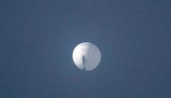 This file photo taken on February 01, 2023, shows a suspected Chinese spy balloon in the sky over Billings, Montana. (Photo by Chase Doak / AFP)