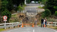 This photo shows the remains of the Puketapu Bridge that washed away during Cyclone Gabrielle near Napier on February 16, 2023. Photo by AFP