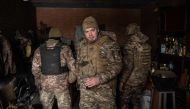 Ukrainian servicemen of the 93rd brigade await a fire-mission order for their French 120mm rifled towed mortar (designated as a MO-120-RT-61) position, in Bakhmut on February 15, 2023, amid the Russian invasion of Ukraine. (Photo by YASUYOSHI CHIBA / AFP)