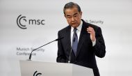 China's Director of the Office of the Central Foreign Affairs Commission Wang Yi delivers a speech at the Munich Security Conference (MSC), on February 18, 2023. (Photo by Odd Andersen / AFP)
 