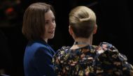 Moldova's President Maia Sandu (left) and Denmark's Prime Minister Mette Frederiksen talk as they attend the Munich Security Conference in Munich, southern Germany, on February 18, 2023. (Photo by Odd Andersen / AFP)