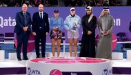 Qatar, Tennis, Squash and Badminton Federation President Nasser bin Ghanim Al Khelaifi and TotalEnergies Qatar Country Chair and TotalEnergies EP Qatar Managing Director Matthieu Bouyer with the Qatar TotalEnergies Open finalists and officials following the presentation ceremony.