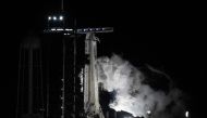 The SpaceX Falcon 9 rocket with the company Crew Dragon spacecraft vents fuel prior to a scrubbed launch from pad 39A for the Crew-6 mission at NASA's Kennedy Space Center in Cape Canaveral, Florida, on February 27, 2023. (Photo by Jim WATSON / AFP)