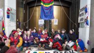Sweden's Greta Thunberg (rear, 3rd R) and other young climate activists from the 