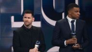 France and Paris Saint-Germain forward Kylian Mbappe and Argentina and Paris Saint-Germain forward Lionel Messi receive awards for the FIFA FIFPRO men's World11 during the Best FIFA Football Awards 2022 ceremony in Paris on February 27, 2023. (Photo by FRANCK FIFE / AFP)