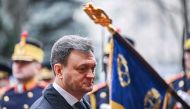 Moldovan Prime Minister Dorin Recean attends an official welcoming ceremony with his Romanian counterpart (not in picture) at Victoria Palace, the Romanian Government headquarters in Bucharest March 1, 2023. (Photo by Daniel MIHAILESCU / AFP)