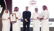 QIC representatives receiving the award.