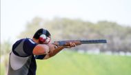 A Qatari shooter in action during a training session at the Lusail Shooting Range.